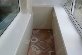 Отделка балкона под ключ с холодным остеклением и выносом остекления