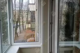 Отделка балкона под ключ с холодным остеклением и выносом остекления