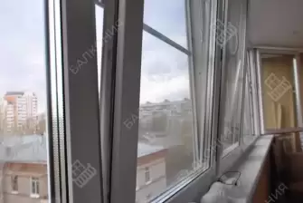 Остекление лоджии окнами с мультифункциональным стеклопакетом и отделка